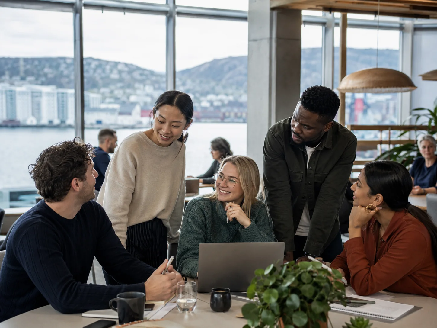 International students collaborating in a Nordic workspace